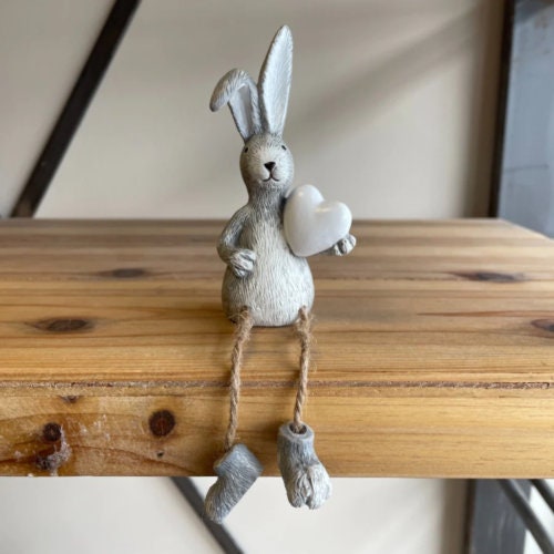 Rabbit with dangling legs - holding heart/or Easter Egg